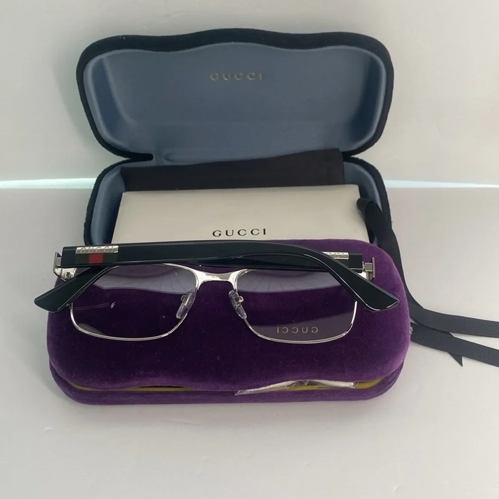 GUCCI GG0750O 001 square optical matte black and silver with shiny black frame.